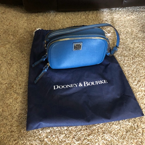 Dooney & Bourke Handbags - Dooney & Bourke blue leather purse. NWOT